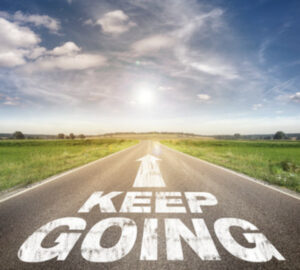 'Keep going' 이 적힌 도로 위를 달리는 형태를 보여주며 양방 베팅의 지속 가능성을 비유